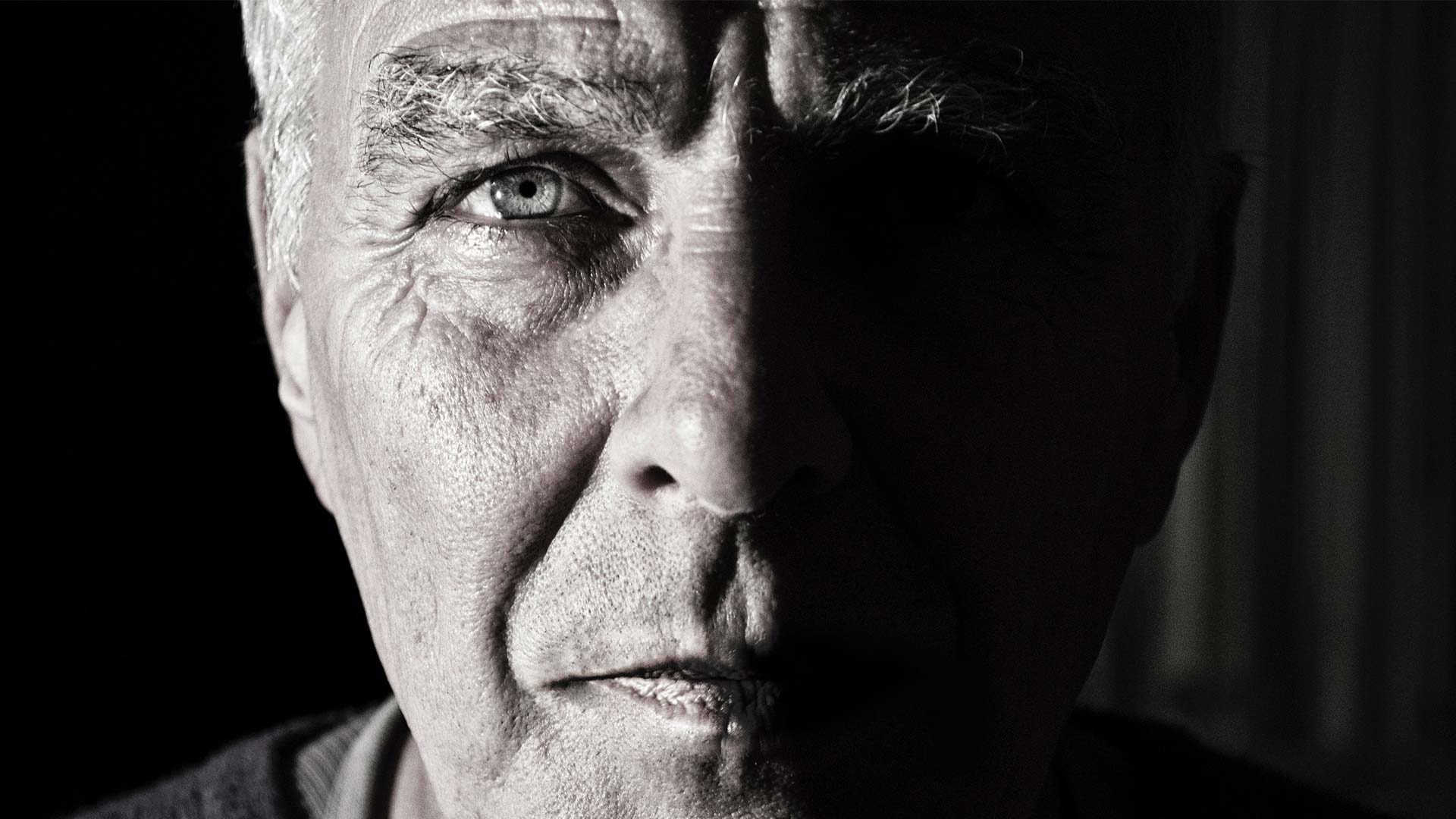 Signs you have cataracts man's face focused on his eye
